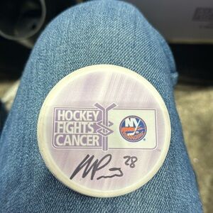 ALEXANDER ROMANOV signed hockey puck. Islanders player #28